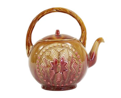 A Linthorpe Pottery Teapot, shape No.806, moulded with a repeating Aztec star designs to each side, impressed LINTHORPE 806 H