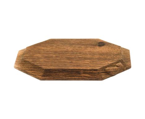 Workshop of Robert Mouseman Thompson (Kilburn): An English Oak Bread Board, of octagonal form, with carved mouse trademark,30