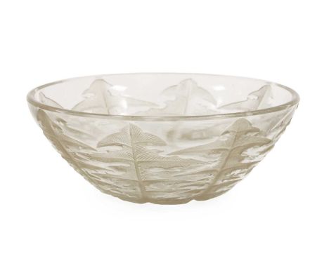 René Lalique (French, 1860-1945): A Pissenlit Sepia Stained Glass Bowl, No.3104, the underside moulded with dadelions, moulde