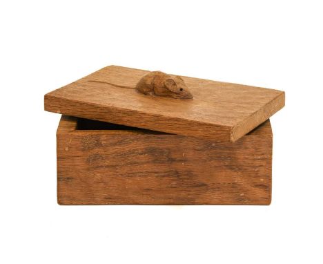 Workshop of Robert Mouseman Thompson (Kilburn): An English Oak Trinket Box and Cover, of rectangular form, the cover with car