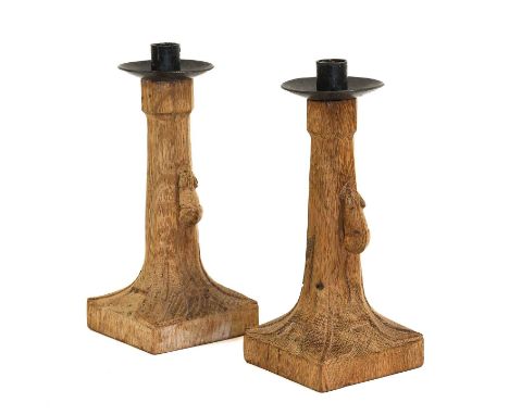 Workshop of Robert Mouseman Thompson (Kilburn): A Pair of English Oak Candlesticks, of octagonal form on square bases, with w