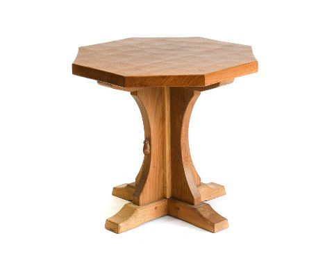 Workshop of Robert Mouseman Thompson (Kilburn): An English Oak Octagonal Coffee Table, the adzed top on a cruciform base, wit