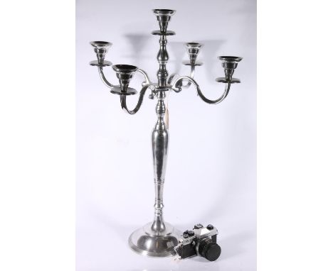 Large aluminium five-branch candelabra, 80cm and a Praktica TL3 camera, both items previously featured in 'T2 Trainspotting' 