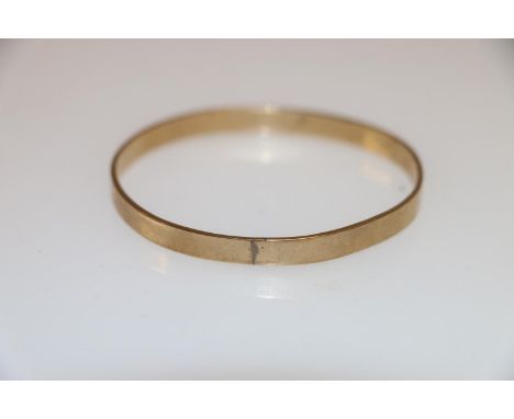 9ct gold bangle of plain form, 14.9g. 