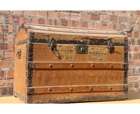 Wood-bound domed-top cabin trunk. 