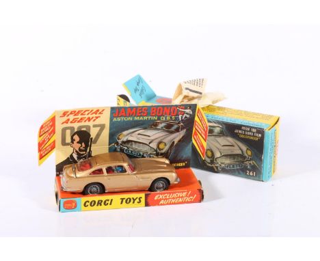 Corgi Toys: James Bond Aston Martin DB5 die-cast scale model, number 261. Original paper elements are all intact and included