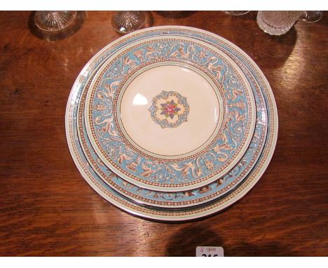 A large quantity of Wedgwood "Florentine" pattern table wares including lidded tureens, meat plates, coffee pots, cup, saucer