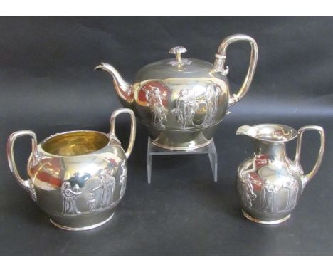 An early Victorian silver three piece tea service, design of maiden playing the lyre, floral knops, London 1840, 1350g
