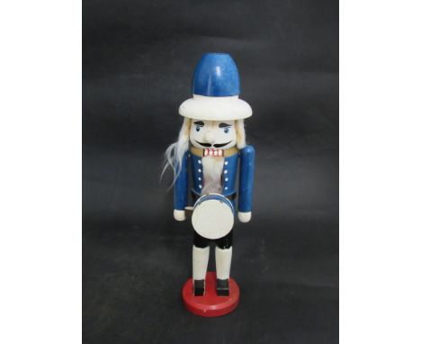 A wooden nut cracker as a drummer, 36cms tall 