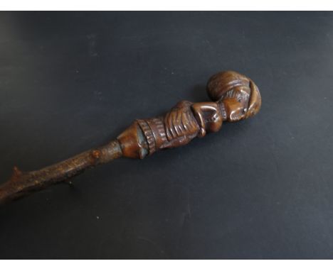 An Edwardian briar wood walking stick with carved Indian woman handle