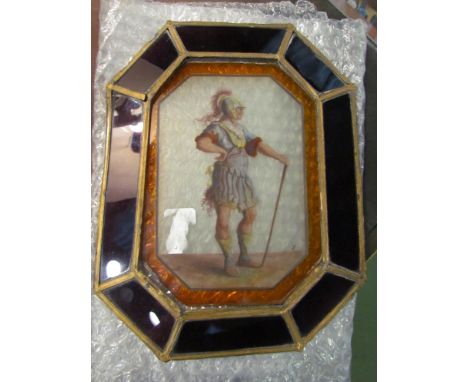 A canted rectangular stained glass panel depicting a hand painted image of a Roman Soldier set with amethyst and amber colour