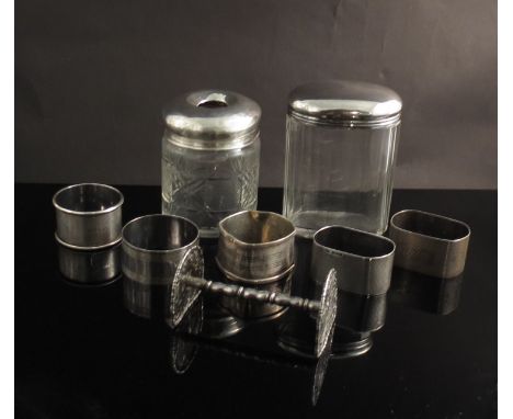 Five silver napkin rings, two silver top glass jars, Chinese chopstick stand with dragons