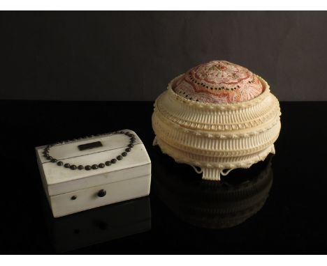 An early 20th Century Ivory carved pin cushion and Ivory trinket box with steel button detail and a Shagreen interior 