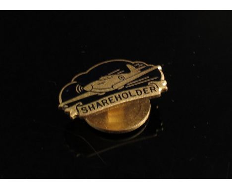 A yellow metal and black enamel spitfire shareholder badge with lapel stud.  WWII reward to top, collector of aluminium pans 