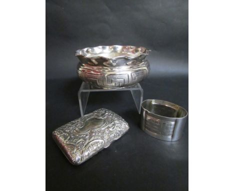 An embossed plated cigarette case, plated napkin ring and Greek key border bowl stamped 925 Garabet (3)