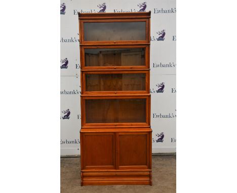 Globe Wernicke type Barrister's teak bookcase with five glazed sections above a cupboard base, paper labels to the back and D