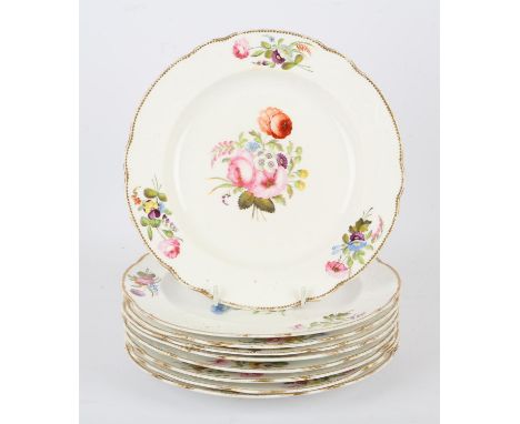 Set of nine Spode cabinet plates, depicting floral sprays, with similar moulded design borders and gilt edges, 22 cm diameter