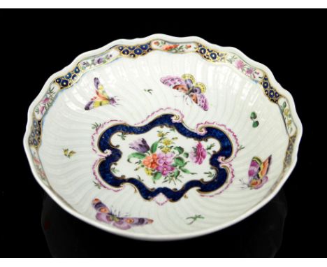 Worcester First Period scale blue and enamelled dish, depicting floral sprays and butterflies with shaped edge, fret mark, 25