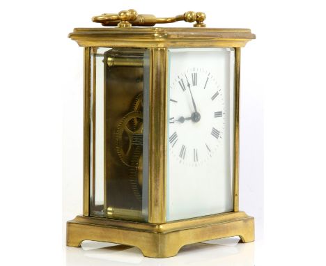 Brass and four glass carriage clock with French barrel movement, the white enamelled dial with Roman numerals, 14.5cm high,