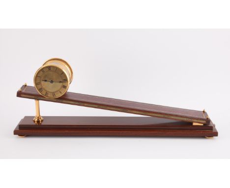 Dent type Inclined Plane brass table clock, with leather lined mahogany stand, 10cm diameter, stand 61 cm long