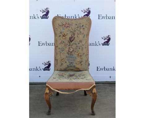 19th century walnut framed high back chair with tapestry seat and back on carved cabriole legs,