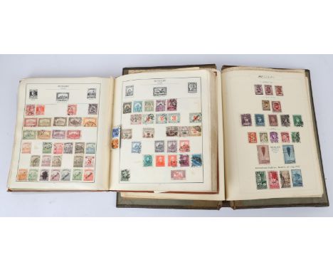 Two Albums of World Stamps, including The Strand Stamp Album, with Great Britain 1d reds used, British Commonwealth, etc.