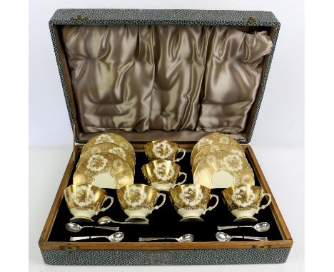 Cased set of six Hammersley coffee cups and saucers, with gilded floral decoration and six spoonsCondition Report:  One catch