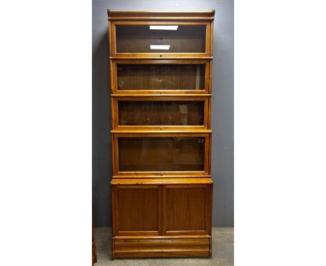 Globe Wernicke type Barrister's teak bookcase with five glazed sections above a cupboard base, paper labels to the back and D