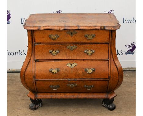 19th century Continental walnut bombe commode with serpentine top edge over four long drawers on lion's paw feet, h82 x w87 x