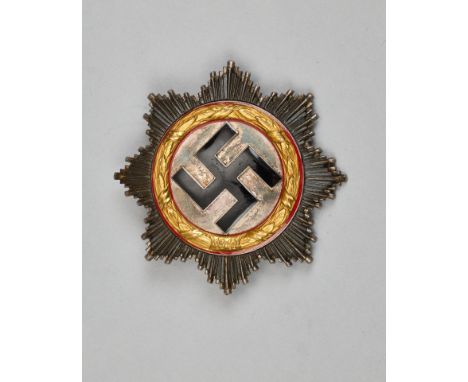 Orden und Ehrenzeichen - Deutsches Kreuz : Deutsches Kreuz in Gold.Buntmetall / Cupal. Der Kranz vergoldet und von rot emaill