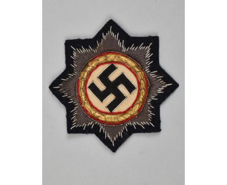 Orden und Ehrenzeichen - Deutsches Kreuz : Deutsches Kreuz in GoldGestickte Ausführung aus Wollfäden und Metallfadenstickerei