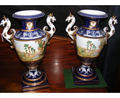 Pair of decorative continental ceramic urns with classical garden scene decoration - 50cm high