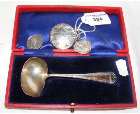Cased silver ladle, Art Nouveau silver button, etc.