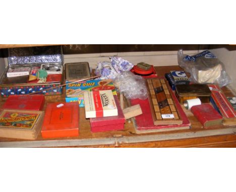 Assorted games, including dominoes, cribbage, draughts, etc.