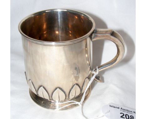 A miniature tankard with stylized leaf surround to the foot - Birmingham 1929