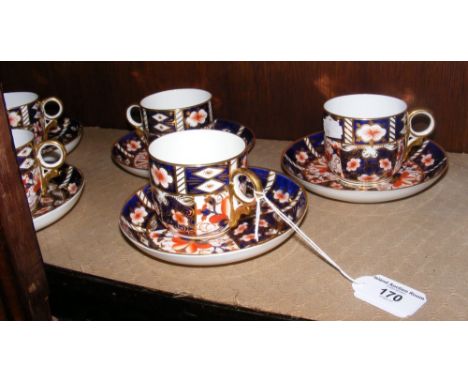 Five Royal Crown Derby "Imari" pattern cabinet cups and saucers