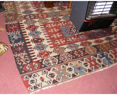 A 330cm x 170cm Kilim carpet