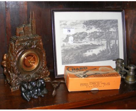 A mantel clock timepiece with cathedral mount, corkscrew, hair clippers, etc.