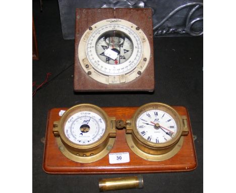 Brass cased ship's clock and barometer on wooden base, Sestrel double compass, etc.