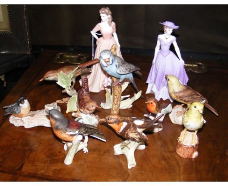 Coalport figurines, together with Goebel bird ornaments