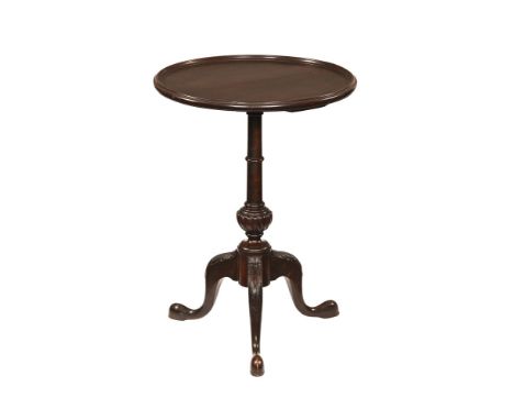 An early 20th century tripod occasional table in the Georgian style, with dished top above a central column raised on three l
