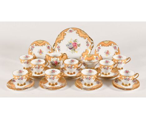 A Shelley fine bone china part tea set, with gilt decoration and floral sprays, comprising teacups, saucers, milk and sugar b
