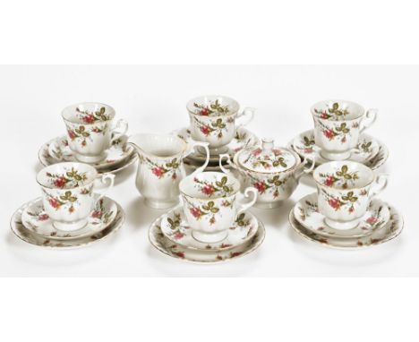 A Polish Chodziez floral patterned tea service, comprising 6 cups, 6 saucers, 6 plates, sugar basin and cream jug.