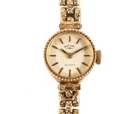 A 9 ct gold cased ladies Rotary wristwatch, with 9 ct gold integral bracelet, with champagne dial with baton markers, knob wi