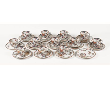 A late 19th century ceramic Copeland and Garrett part tea and dinnerware in the tobacco leaf pattern, comprising 12 cups, 12 