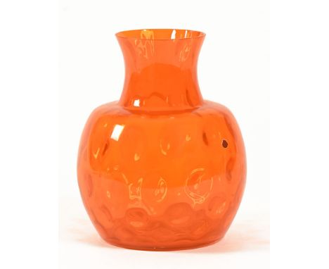 An Italian Art Glass orange vase, with dimple effect.  Height +/- 30 cm.   CONDITION REPORT:  The vase is in generally good o