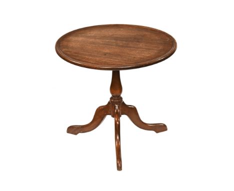 A 20th century tripod occasional table, with dished top single column support and downswept legs.  Height 41 cm, diameter 46 