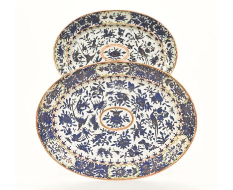 Two antique Chinese meat plates, decorated with floral and bird motifs.  Largest width 42.5 cm, smallest 33.5 cm.   CONDITION