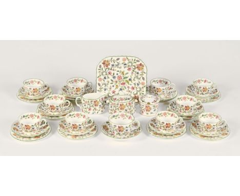 A Minton Haddon Hall pattern part tea service, with cream jug, 10 matching cups etc. (+/- 37 pieces).