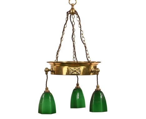 An Art Deco brass ceiling hanging light fitting, with three green glass shades.  Overall length when hanging 71 cm, diameter 